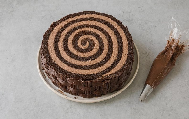 Piping chocolate ganache strips to create a bark effect