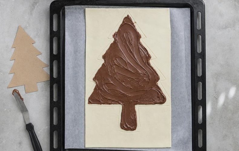 Nutella Puff Pastry Christmas Tree, step 1: Nutella spread over a sheet of puff pastry