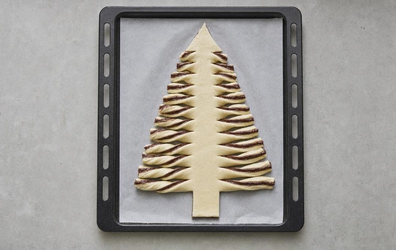 Nutella Puff Pastry Christmas Tree, step 4: pastry strips twisted into branches