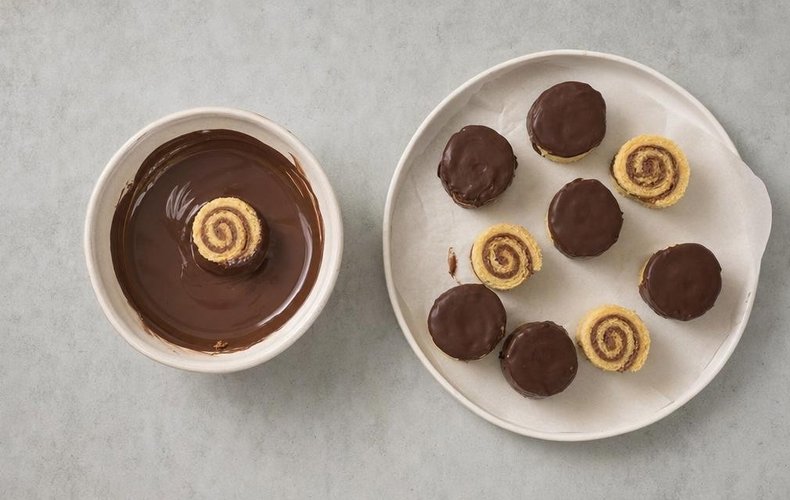 Pandoro Pinwheels, step 5: pinwheels dipped in melted dark chocolate