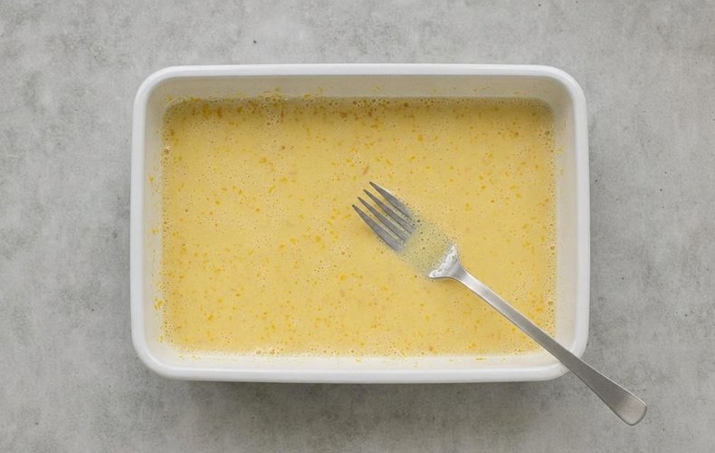 Panettone French Toast, step 2: eggs, sugar, vanilla, lemon zest and milk whisked into a batter