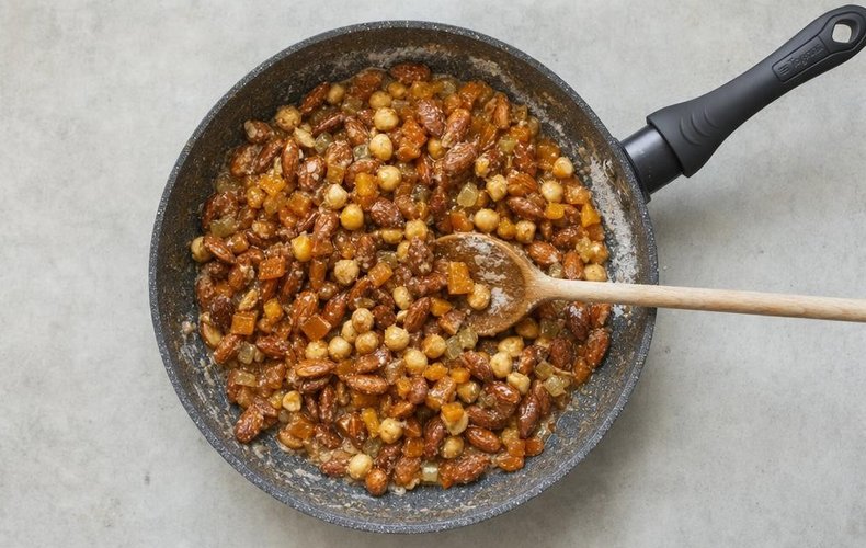 Panforte, step 3: the mixture spread in a pan lined with wafer paper