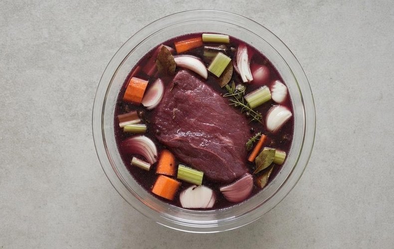 Pasta al Brasato, step 2: the beef covered with red wine for the marinade