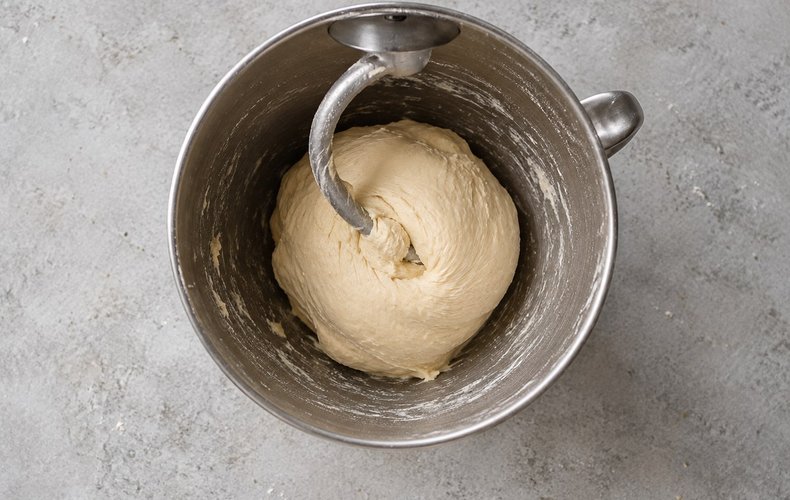 Pesto Bread Wreath, step 2: kneading the dough with the egg and water