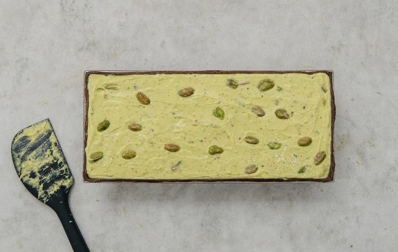 Pistachio Torrone, step 3: pistachio filling poured into the chocolate-lined mold