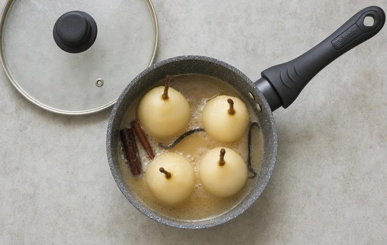 Poached Pears with Coffee Caramel Sauce, step 3: pears submerged in the spiced syrup