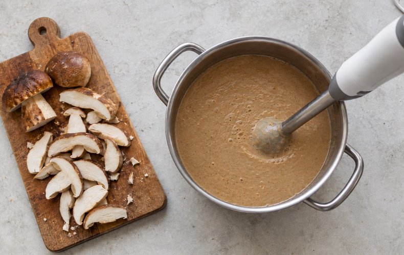 Porcini Mushroom Soup, step 5: porcini caps sliced for garnish and the soup blended until smooth