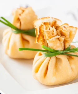 Recipe Porcini and Ricotta Crepe Purses with Grana Padano Sauce