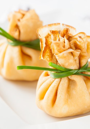 Recipe Porcini and Ricotta Crepe Purses with Grana Padano Sauce