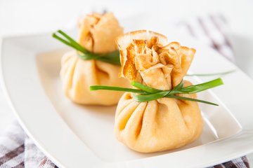 Recipe Porcini and Ricotta Crepe Purses with Grana Padano Sauce