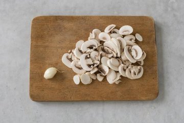 Potato and Mushroom Timbales, step 3: sautéing the sliced mushrooms with garlic