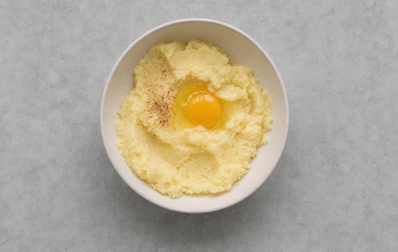Potato and Mushroom Timbales, step 4: mixing the mashed potatoes with butter, Parmigiano and egg