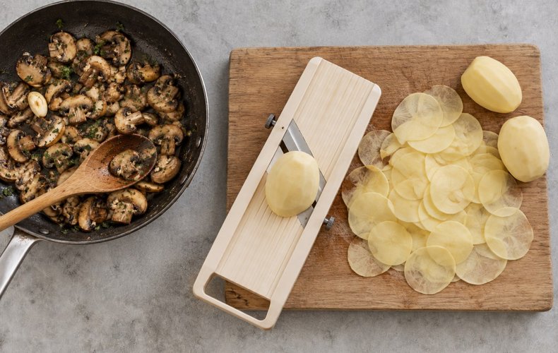 Potato, Mushroom and Scamorza Roll, step 2: slicing the potatoes thinly with a mandoline