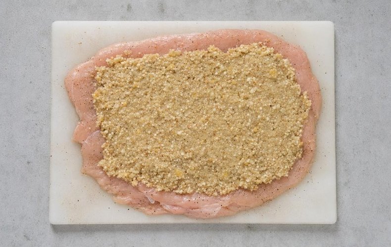Prosecco Chicken Roll, step 3: filling spread over the opened chicken breast