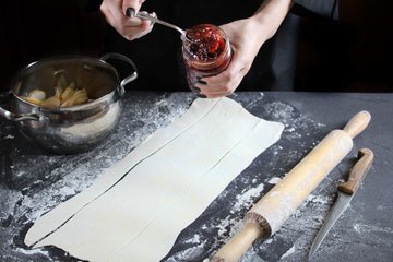 Cutting the puff pastry into strips