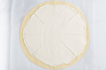Cutting the pastry into eight wedges