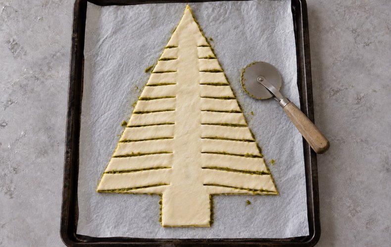 Puff Pastry Christmas Tree, step 4: strips cut along both sides of the tree
