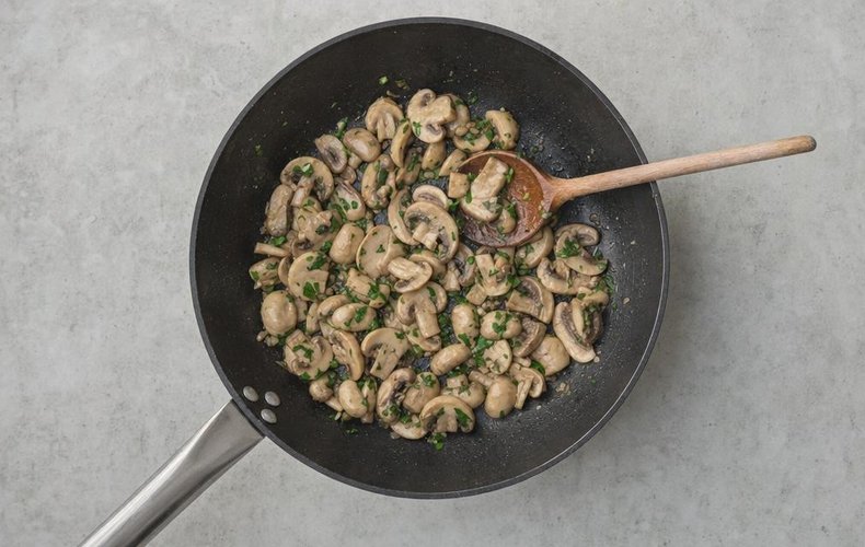 Puff Pastry Cups with Ham and Mushrooms, step 2: tender cooked mushrooms with parsley