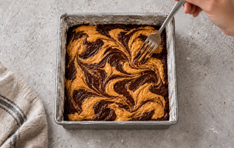 Pumpkin and Amaretti Cheesecake Brownies, step 9: marbled swirl drawn with a fork