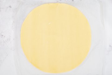 Pricking the puff pastry with a fork