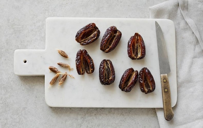 Dates cut lengthwise and opened like a book