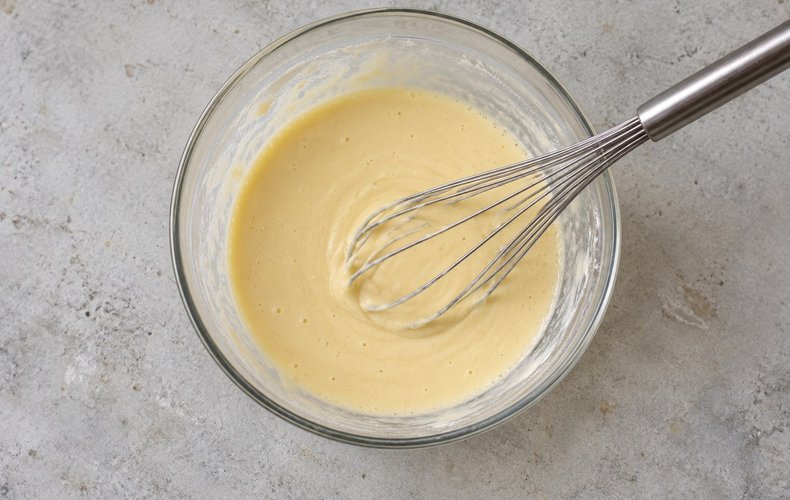 Ricotta and Mushroom Crepes, step 1: crepe batter whisked in a bowl