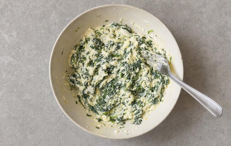 Ricotta and Spinach Puff Pastry Cups, step 2: ricotta, spinach and cheese filling in a bowl