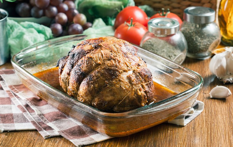 Roast fresh ham in a baking dish