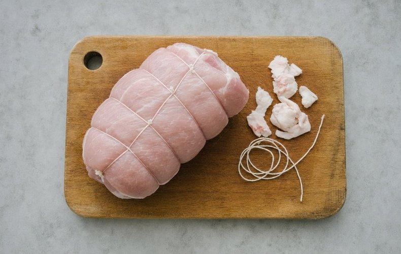 Roast Fresh Ham, step 1: the pork leg trimmed and tied with kitchen twine