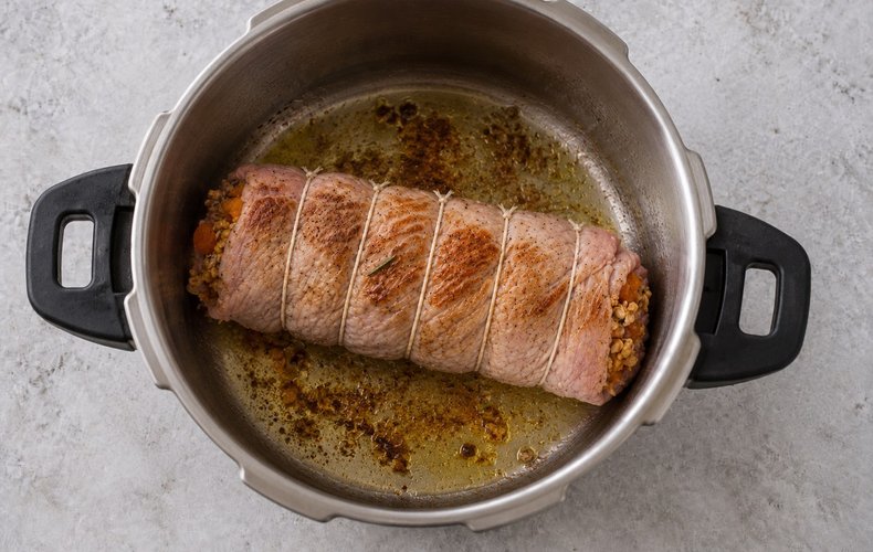 Rolled Veal Roast with Dried Apricots and Walnuts, step 4: browning the roll in the pressure cooker