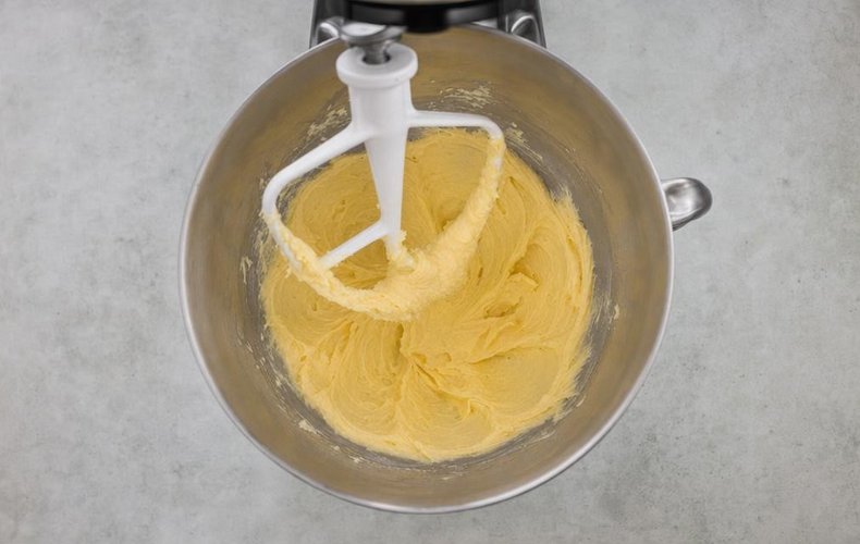 Russian Salad Tartlets, step 2: egg and yolk mixed into the softened butter
