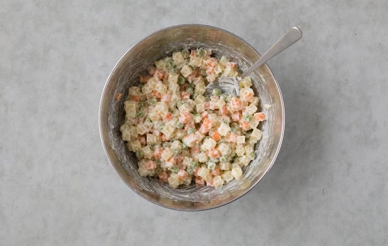 Russian Salad Tartlets, step 7: the vegetables dressed with mayonnaise