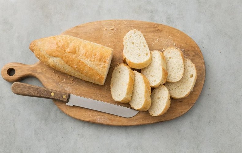 Salami and Olive Canapés, step 1: bread cut into slices