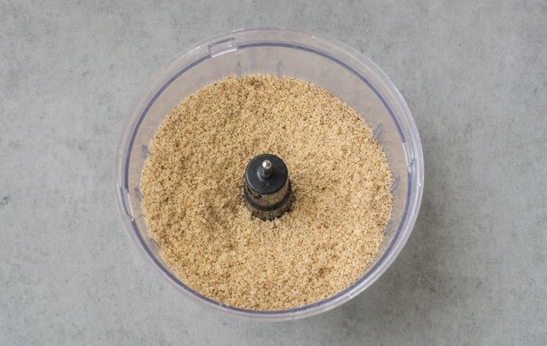 Santa's Mitten Cookies, step 1: hazelnuts and sugar ground to a fine powder in the food processor