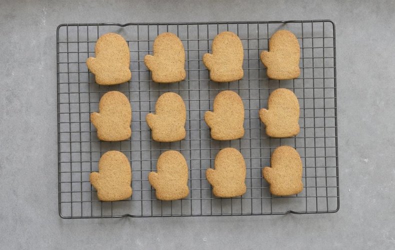 Santa's Mitten Cookies, step 5: the baked cookies cooling on a wire rack