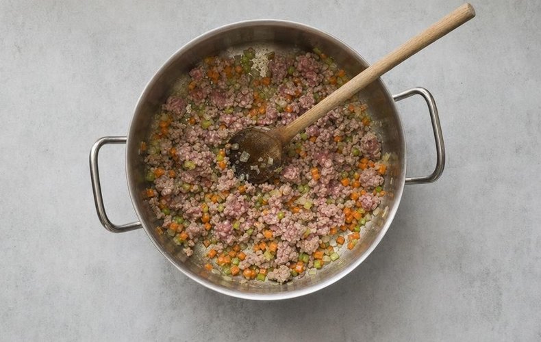 Sausage Ragù Lasagna, step 3: crumbled sausage browning with the vegetables