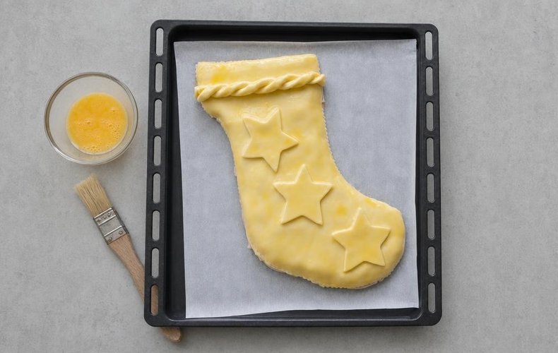 Savory Befana Stocking, step 6: stocking brushed with beaten egg