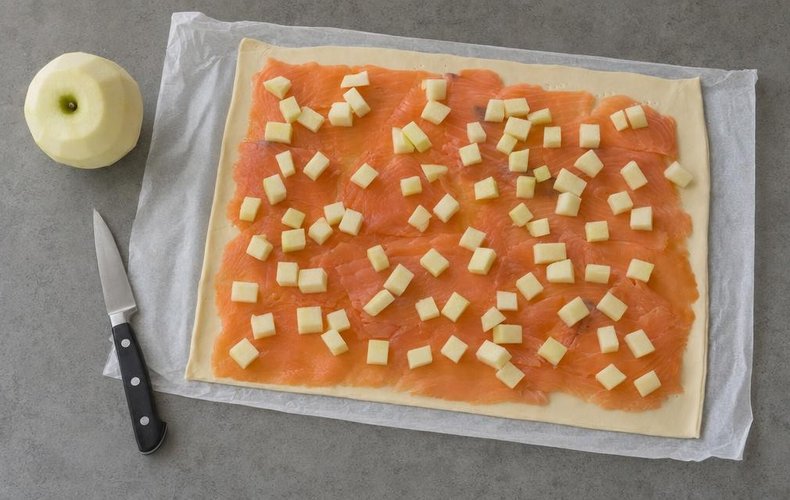 Savory Green Apple and Salmon Strudel, step 2: diced green apple scattered over the smoked salmon