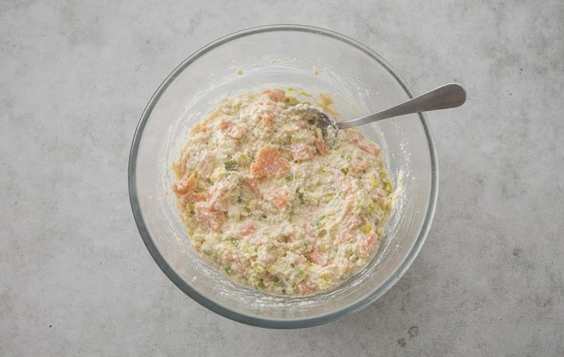 Savory Leek and Salmon Tartlets, step 4: egg, ricotta, leek and smoked salmon filling in a bowl