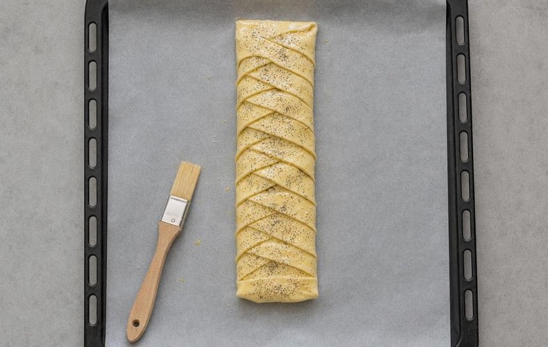 Savory Radicchio, Gorgonzola and Pear Strudel, step 4: brushing with egg and milk and sprinkling with seeds