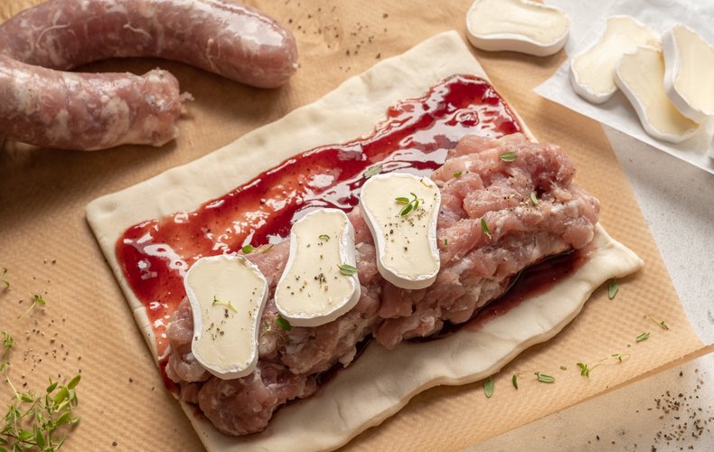 Sliced savory sausage and cranberry strudel