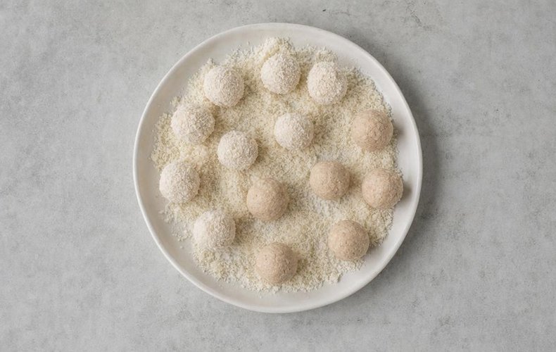 Rolling the balls in bread crumbs