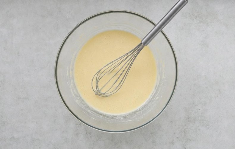 Smoked Salmon Crepes, step 2: whisking the flour into the batter