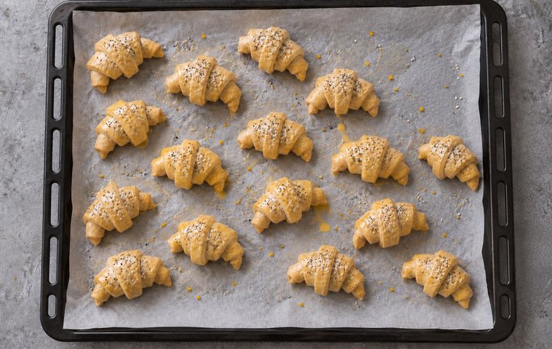 Smoked Salmon Puff Pastry Crescents, step 7: crescents sprinkled with sesame and poppy seeds