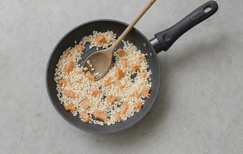 Smoked Salmon Risotto, step 2: toasting the rice with the smoked salmon