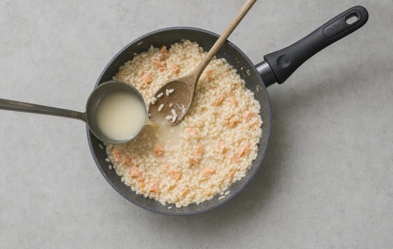 Smoked Salmon Risotto, step 4: the risotto cooking with hot broth
