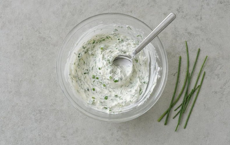 Smoked Salmon Stuffed Potatoes, step 2: mixing the cream cheese with chives, dill, and salt