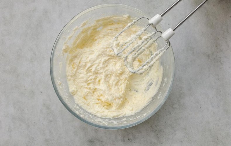 Snowball Cookies, step 1: softened butter, sugar and vanilla beaten until fluffy