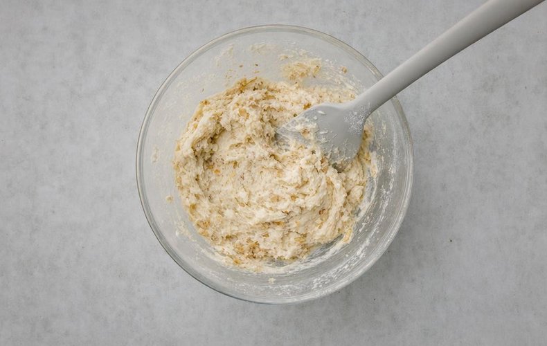 Snowball Cookies, step 2: flour and chopped walnuts mixed into the dough