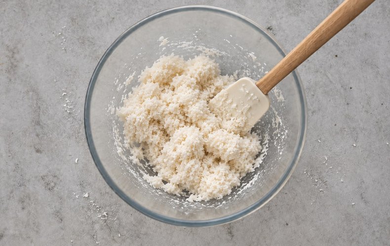 Soft Coconut Macaroons, step 2: the egg whites mixed into the coconut with a spatula